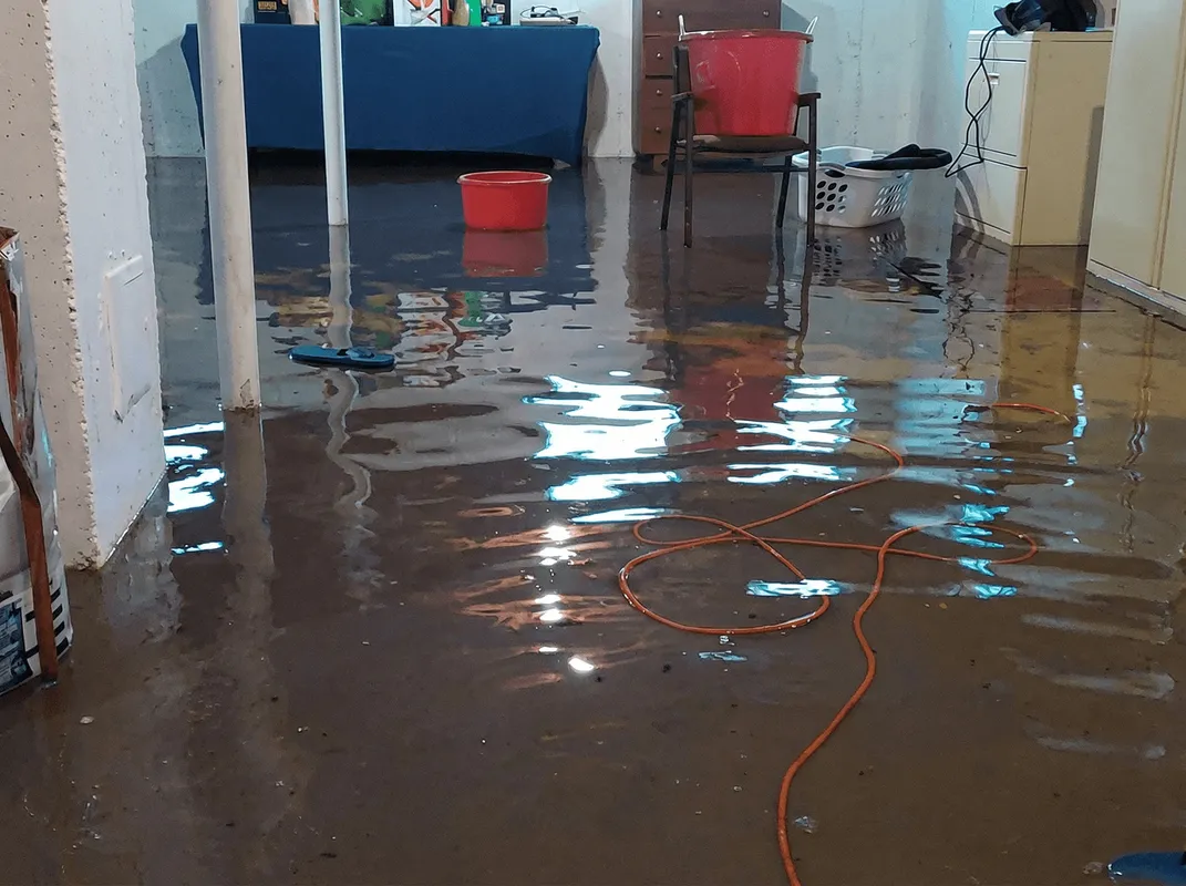 Basement with boiler, cabinets and washing machine completely flooded in Toledo, OH